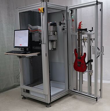 Computer-controlled machine tool by Plek developed for processing stringed instruments