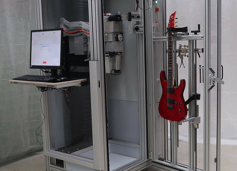 Computer-controlled machine tool by Plek developed for processing stringed instruments